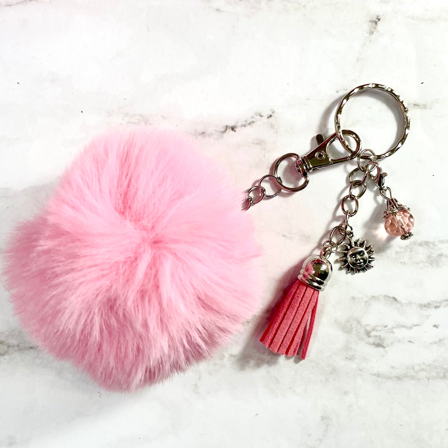 Pink Pom Pom Keychain with Sun Charm