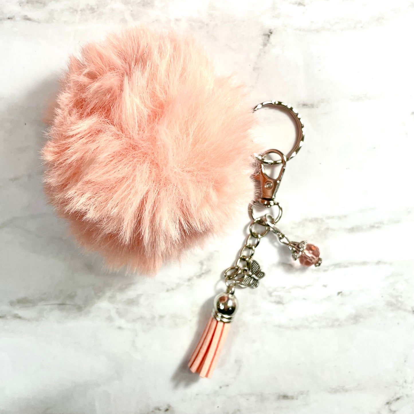 Light Pink Pom Pom Keychain with Butterfly Charm